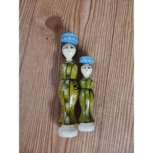 Two Wooden Dolls‎